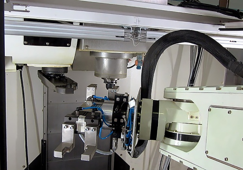 Mechaninio apdirbimo staklių pakrovimo robotas