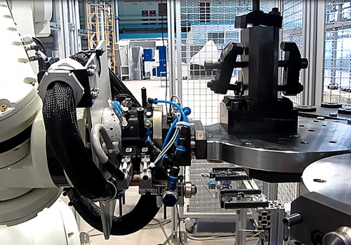 Mechaninio apdirbimo staklių pakrovimo robotas