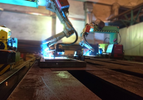 Savivarčių bortų suvirinimo robotai