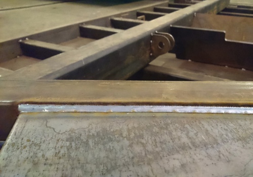 Savivarčių bortų suvirinimo robotai