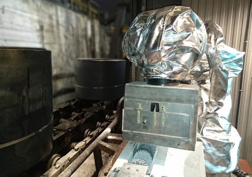 Plieno rulonų žymėjimas robotas