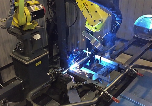 Statybinių vežimėlių suvirinimo robotas