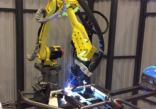 Statybinių vežimėlių suvirinimo robotas