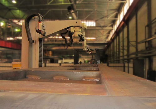 Atvirų vagonų ir vagonečių suvirinimo robotas