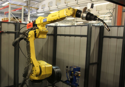 Radiatorių litavimo robotas