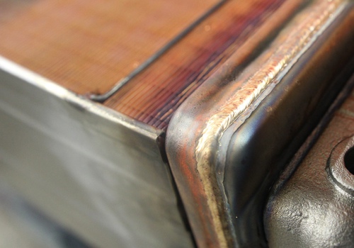 Radiatorių litavimo robotas