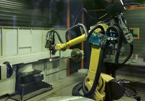 Lazerinio suvirinimo su priedu robotas