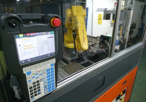 Pakrovimo ir adaptatyvaus iškrovimo robotas