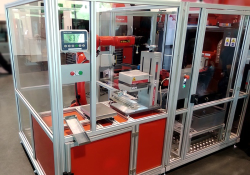 Iškrovimo ir gaminių žymėjimo robotas