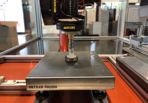 Iškrovimo ir gaminių žymėjimo robotas