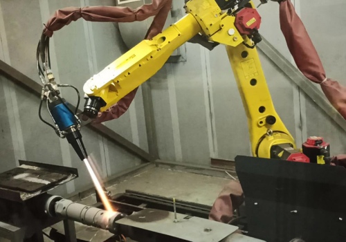 Velenų liepsninio užpurškimo robotas