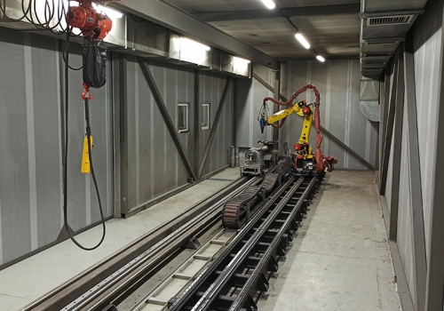 Velenų liepsninio užpurškimo robotas