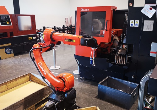 Srieginės mašinos iškrovimo robotas