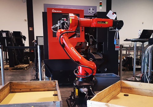 Srieginės mašinos iškrovimo robotas