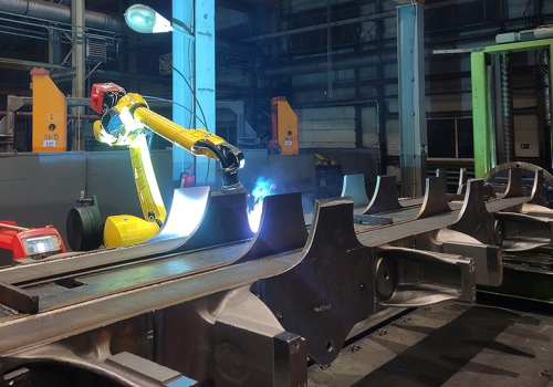 Dyzelinio lokomotyvo vežimėlio rėmo suvirinimo robotas