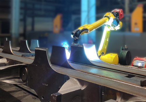 Dyzelinio lokomotyvo vežimėlio rėmo suvirinimo robotas