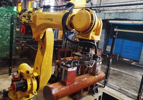 Srieginių staklių iškrovimo robotas