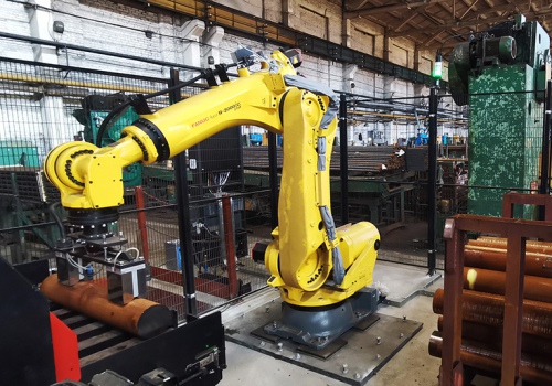 Srieginių staklių iškrovimo robotas