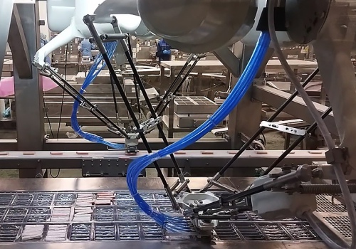 Krabų lazdelių iškrovimo robotai