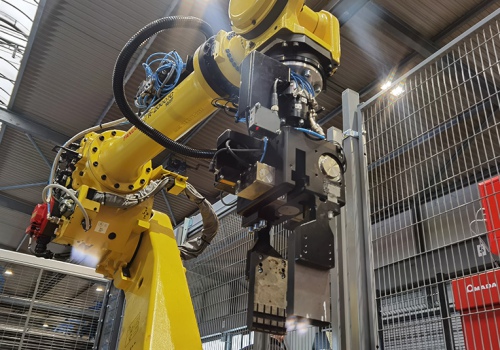 Gaminių iškrovimo ir atmetimo robotas