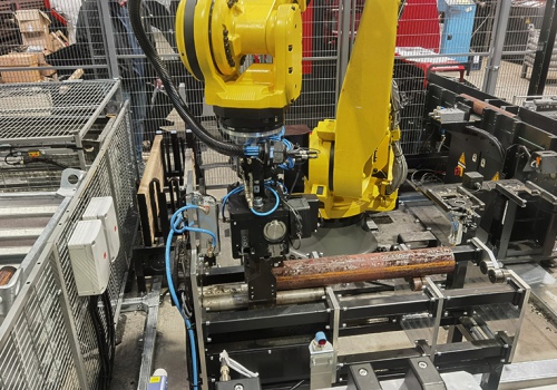 Gaminių iškrovimo ir atmetimo robotas