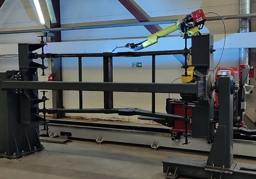 Ekskavatoriaus strėlės suvirinimo robotas