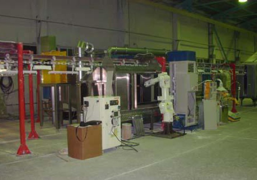 Radiatorių miltelinio dažymo robotas