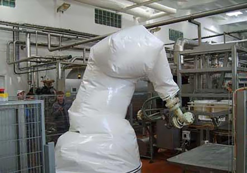 Sūrio presformų pakrovimo robotas