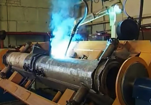 Traktorių elementų suvirinimo robotas